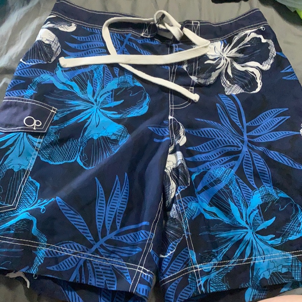 Men’s blue leaf print swim trunks